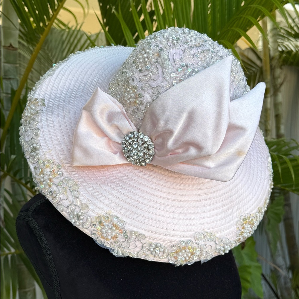 Chic Pink Brimmed Hat with Decorative Bow